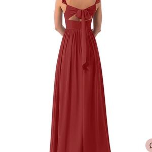 Bridesmaid dress with tags, never been worn. Comes with bag for dress